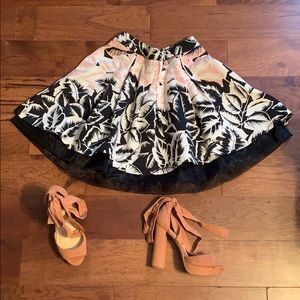 Pink, black and white skirt with floral print